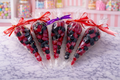 Black and Red gums in a sweet cone
